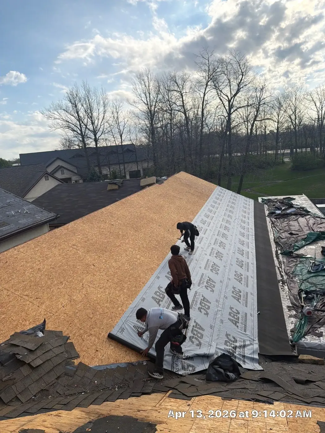 Tarping and dry-in on a Winchester commercial roof